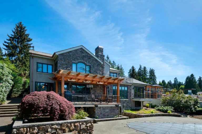 Redmond, WA English chateau reclad with Trespa Pura NFC Siberian Larch