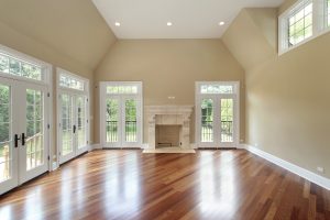 Family room in new construction home with doors to patio
